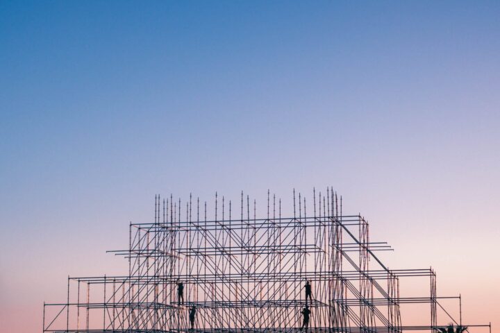 photo of people on building under construction