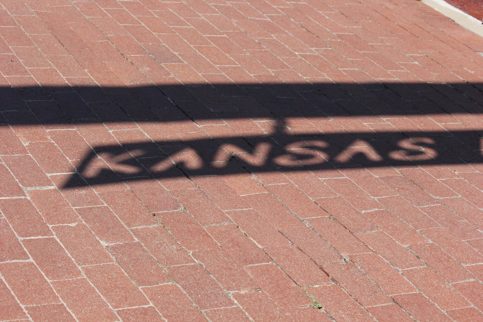 shadows on brick floor