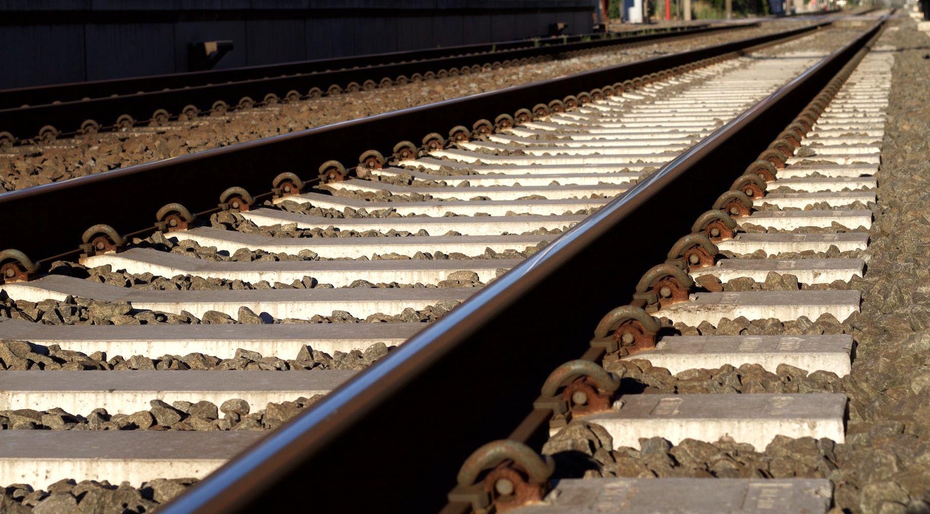 black and gray metal train rail