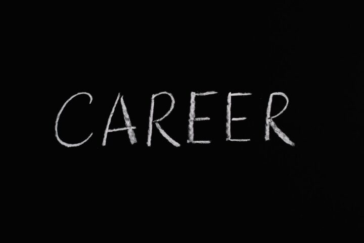 career lettering text on black background