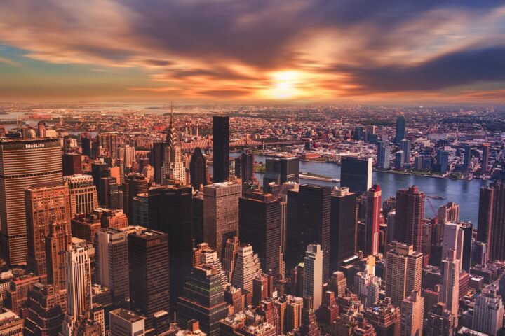 high angle view of cityscape against cloudy sky