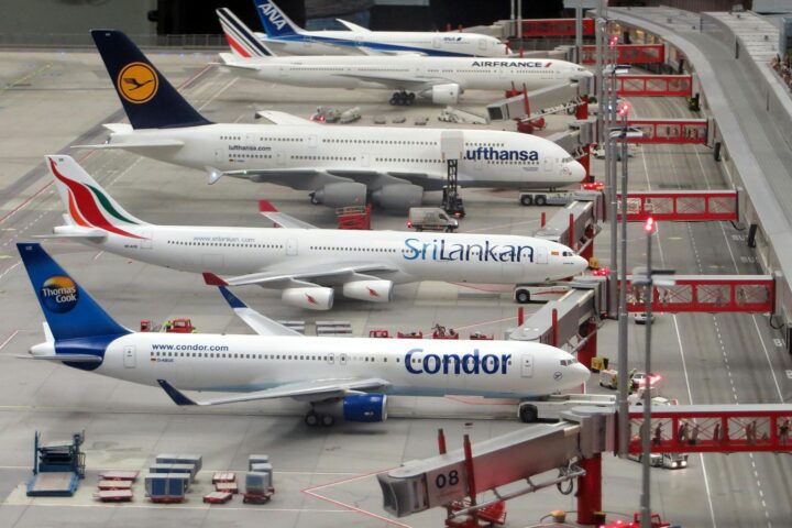 condor airplane on grey concrete airport