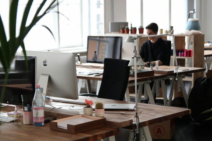 man sitting in front of computer